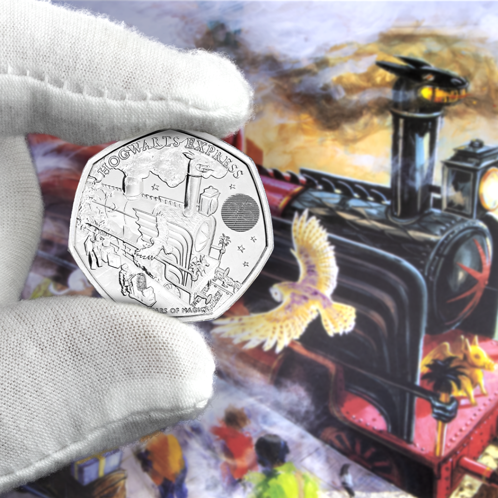 The 2022 UK Hogwarts Express 50p.
Held in white gloved hand, showing the Hogwarts Express from Jim Kay's 2015 illustrated edition of Harry Potter and the Philosopher's Stone book.